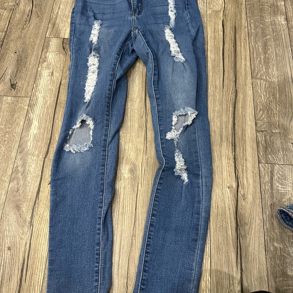 Distressed Blue Jeans